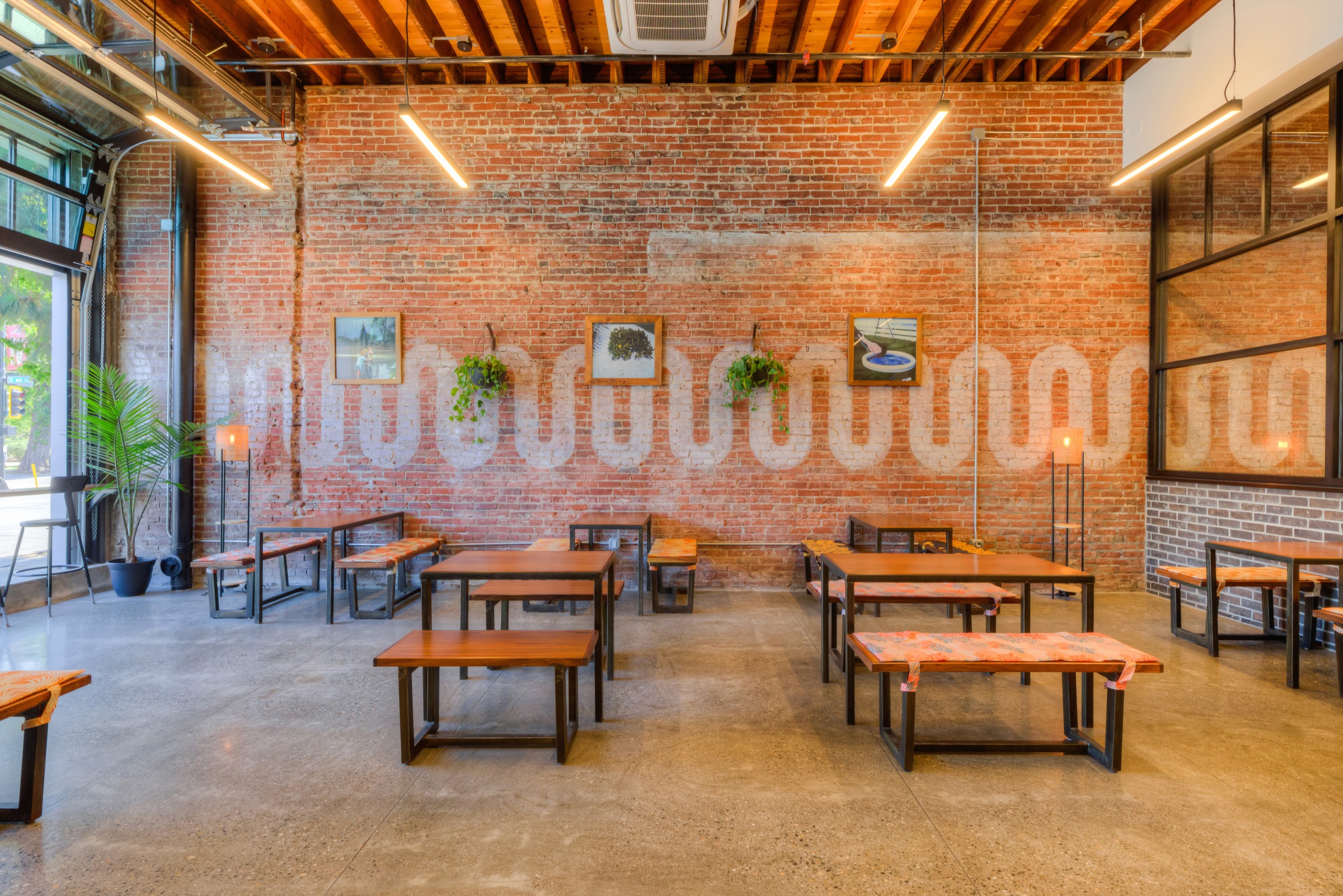 Restaurant interior with exposed brick built by Butte Construction